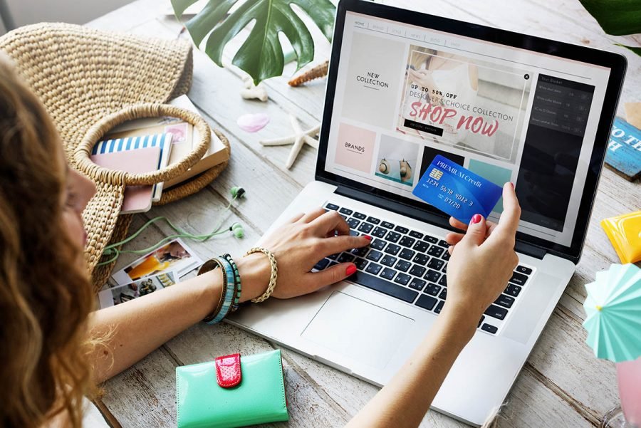 Shopper comparing product options and prices on a laptop