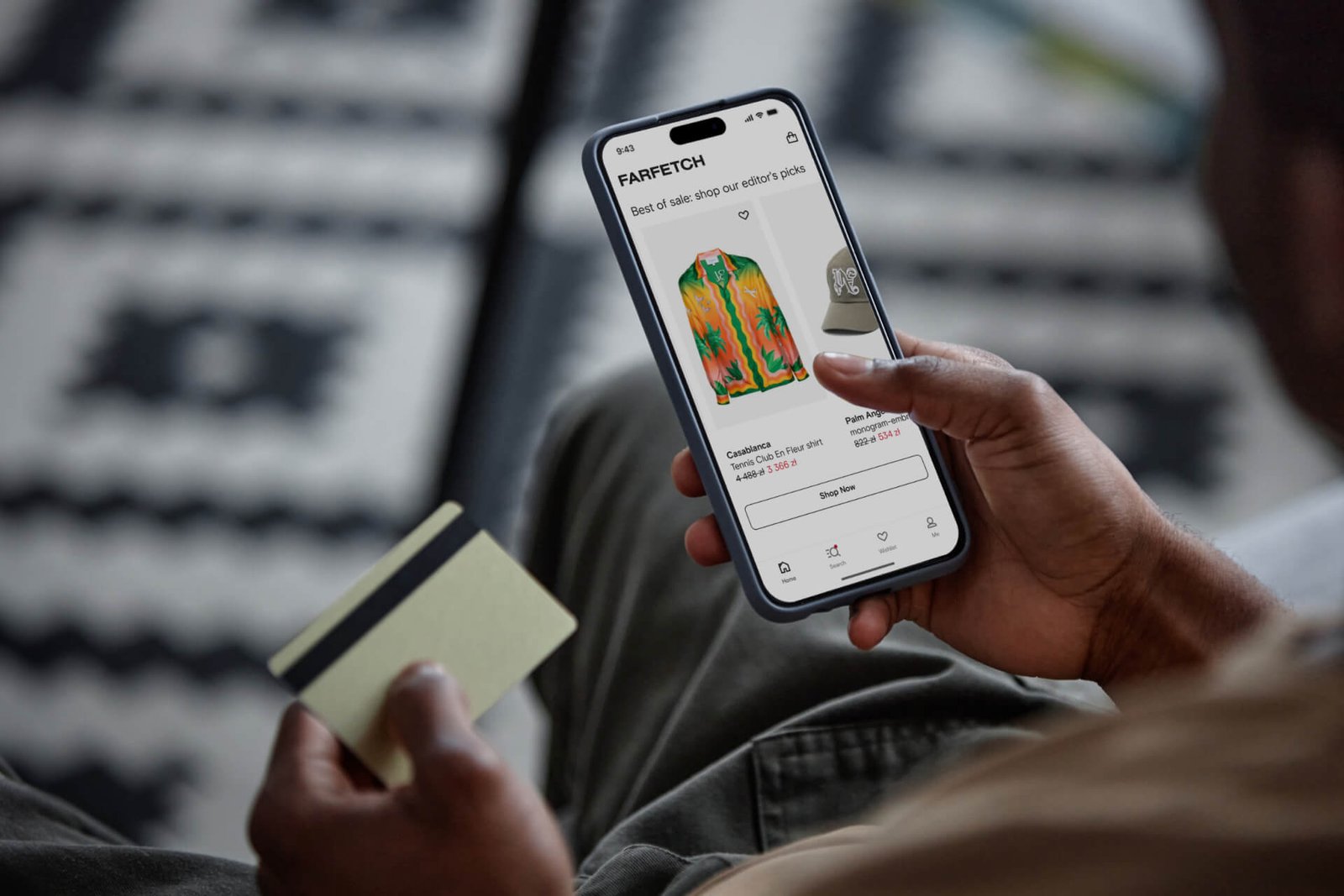 A shopper making a final product choice after comparing three options, important features, ownership cost and warranty