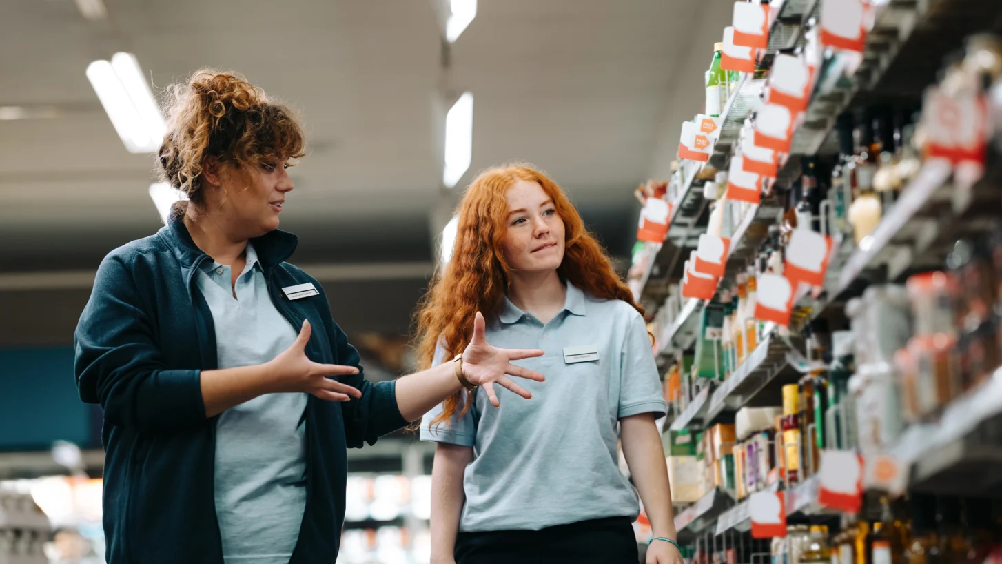 A shopper checking whether a product's published dimensions will fit on a shelf at home